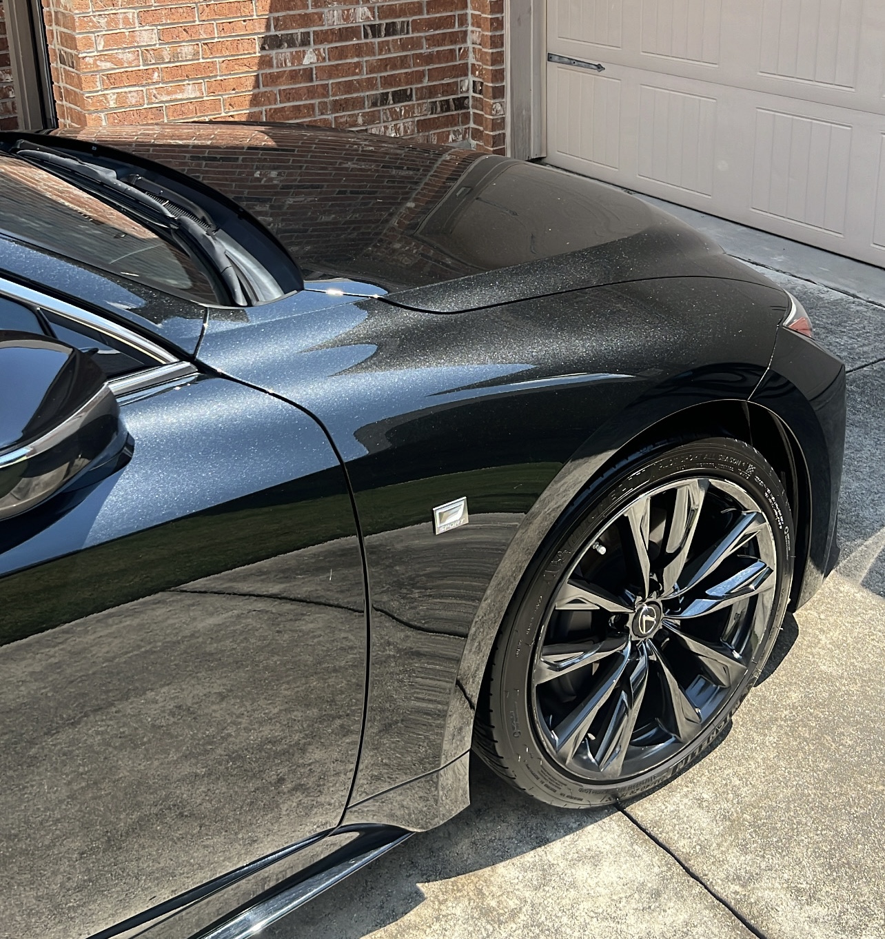 Lexus detailed in Alamo Ranch TX mobile car detailing deep gloss finish black paint and wheel detail